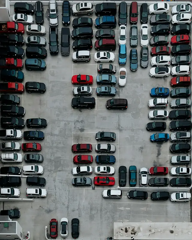 Rental cars parked in rows, seen from above